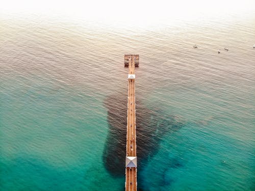 Foto profissional grátis de nascer do sol, píer