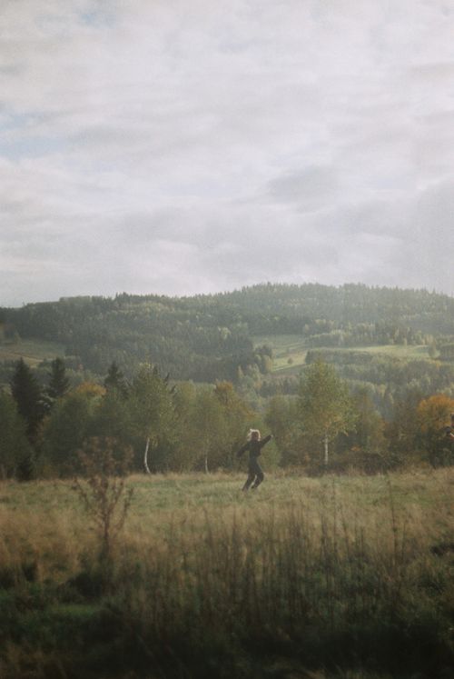 Free A solitary person enjoying a peaceful autumn day in a scenic countryside. Stock Photo