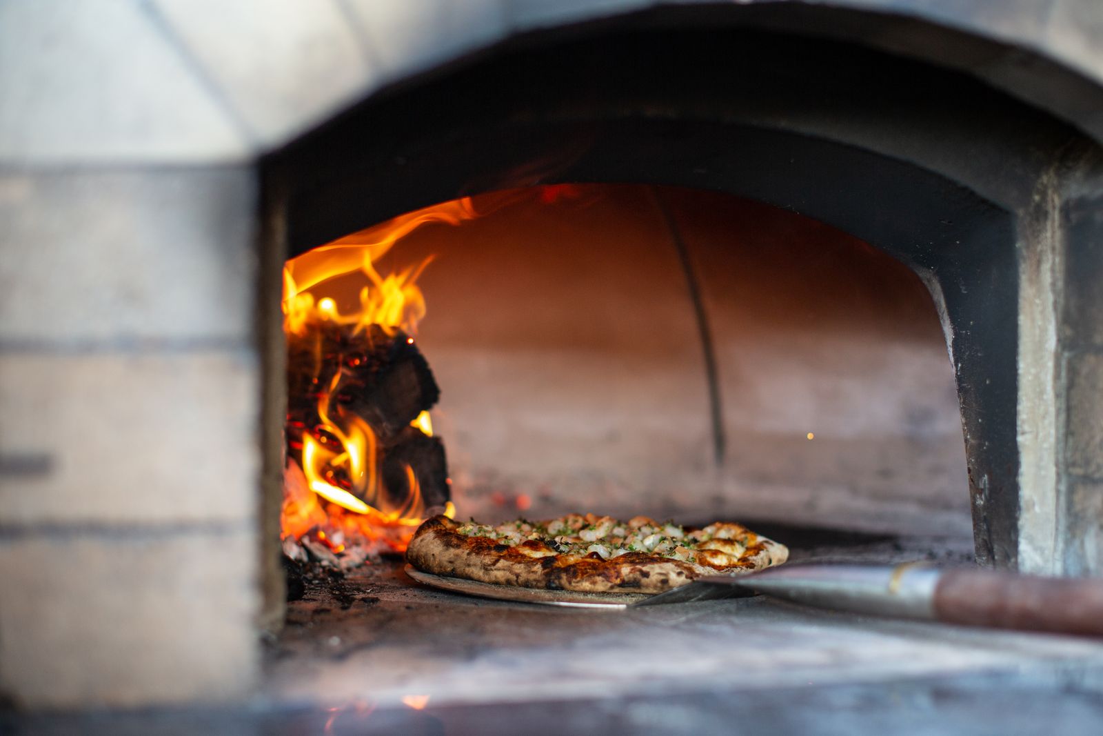 Dish baking in a wood-fired oven
