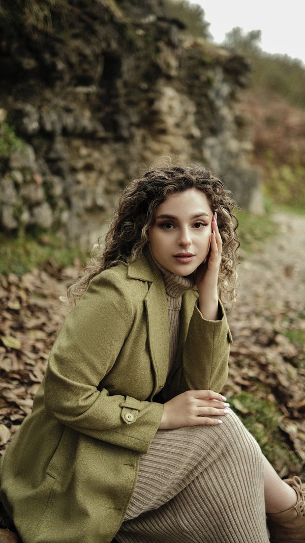 Green wool coat with jeans casual outfit