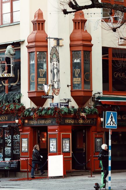 Exterior view of an Irish pub decorated for winter in Gothenburg, Sweden.