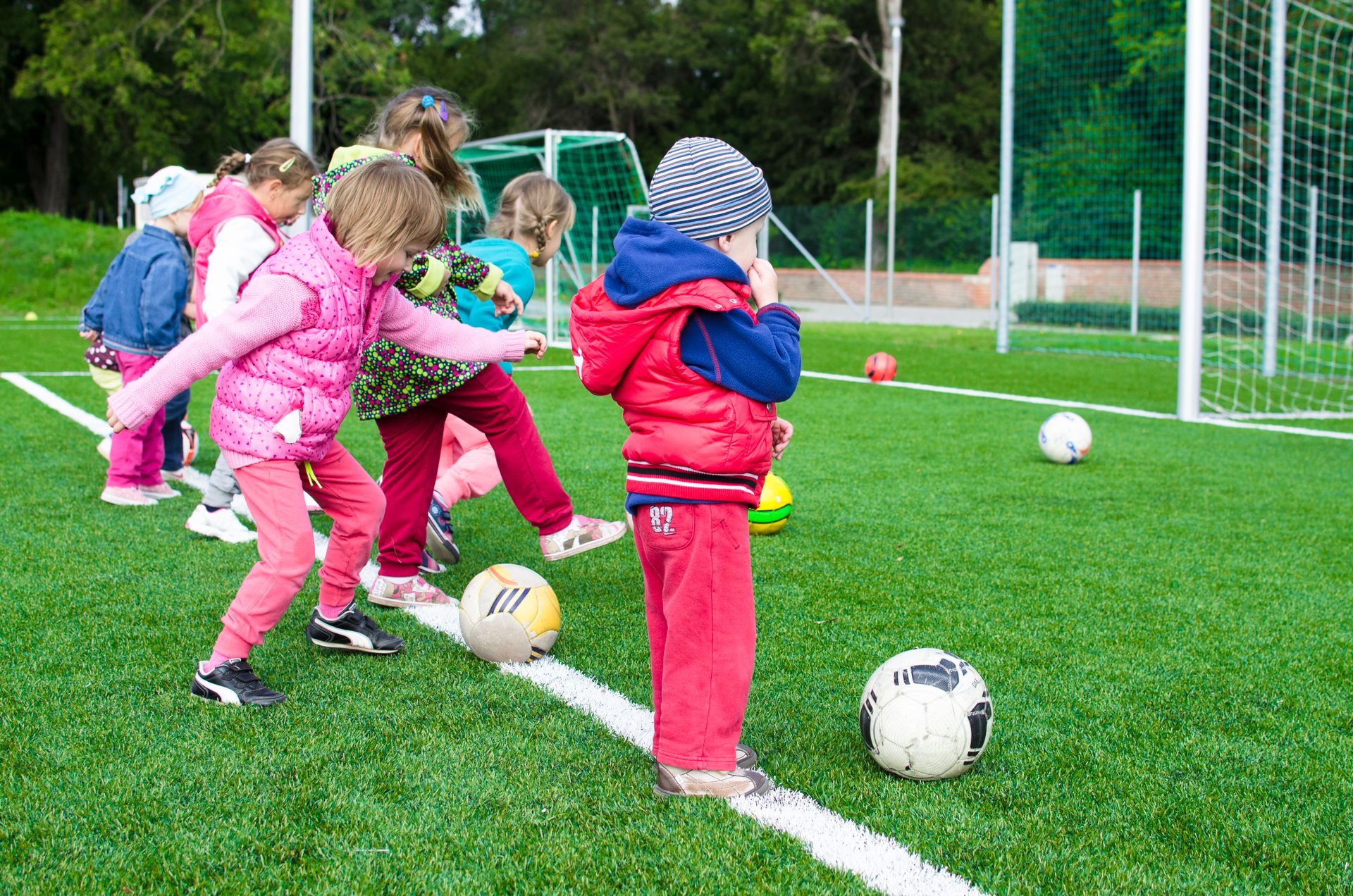 Young players enjoying soccer outdoors