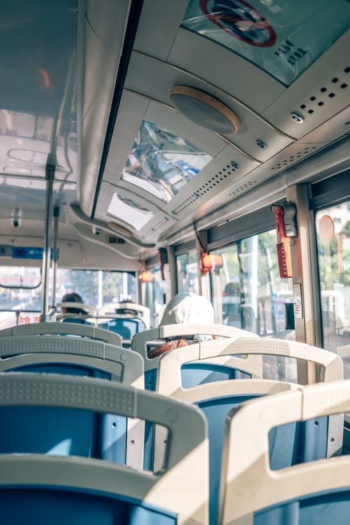 Interior View of a Public Bus with Sunlight · Free Stock Photo