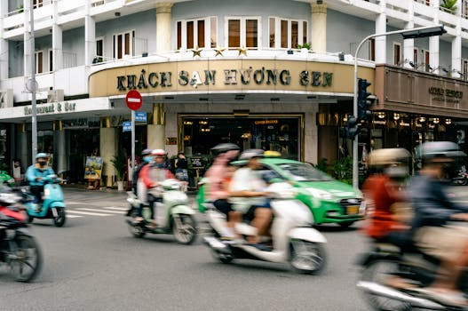 Blurred motion street scene capturing bustling activity in Ho Chi Minh City.