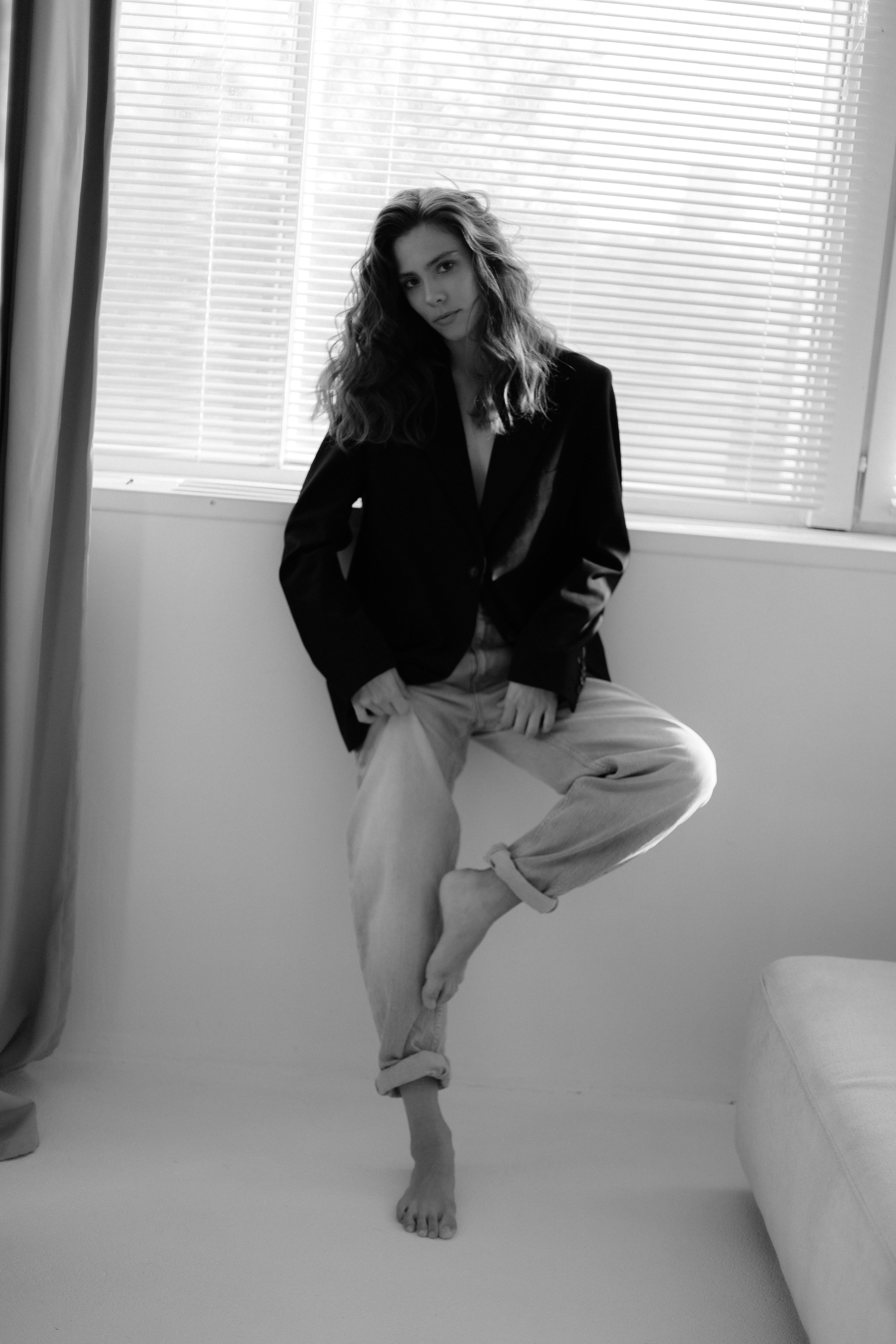 monochrome portrait of woman in fashionable attire