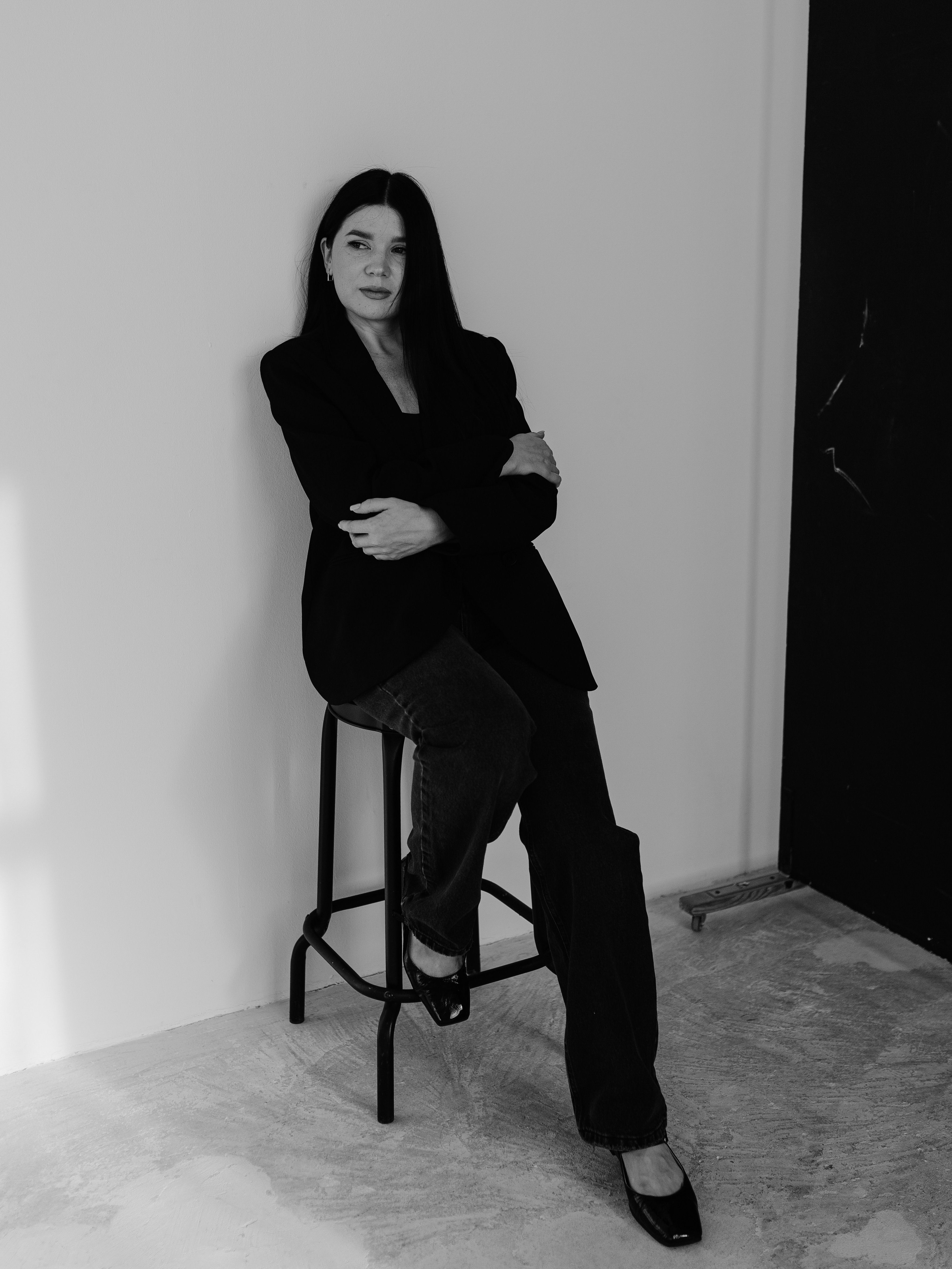 Stylish Woman Posing in Minimalist Interior · Free Stock Photo