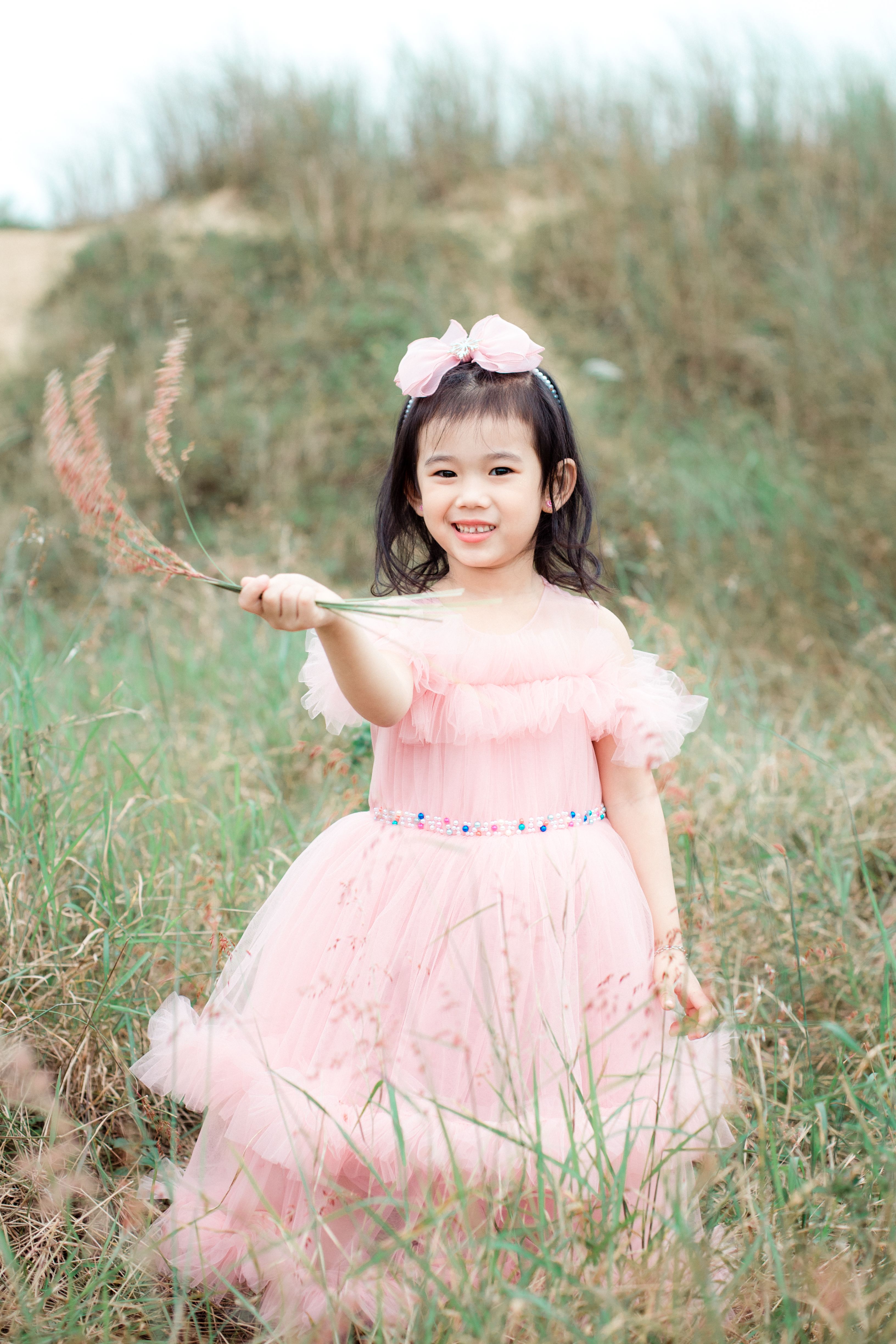 Charming Girl in Pink Dress Outdoors in Hội An · Free Stock Photo