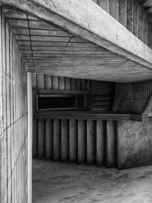 Free A dramatic black and white image of a spiral staircase in Hanoi, Vietnam. Stock Photo