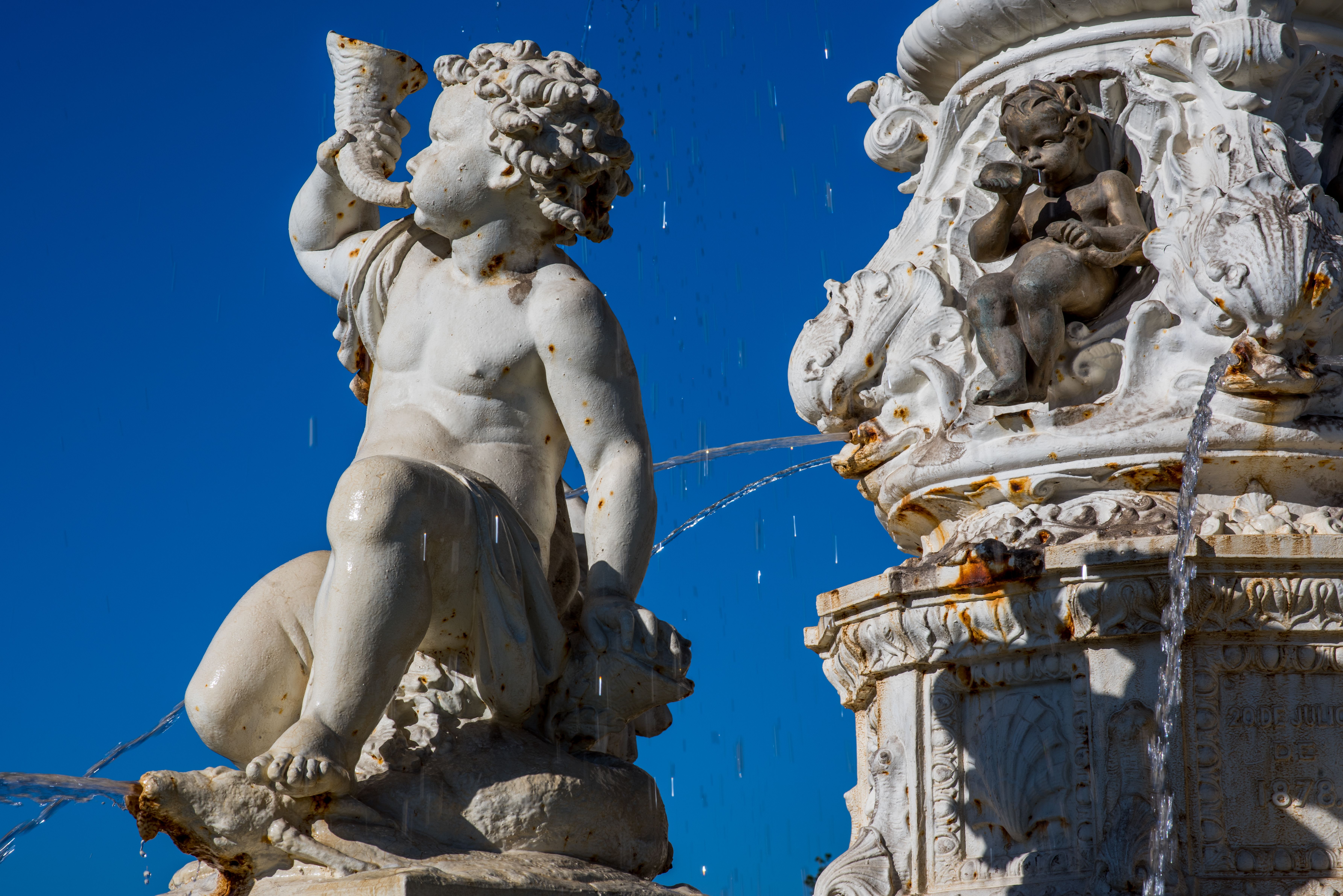Elegant Marble Fountain with Cherub Sculptures · Free Stock Photo