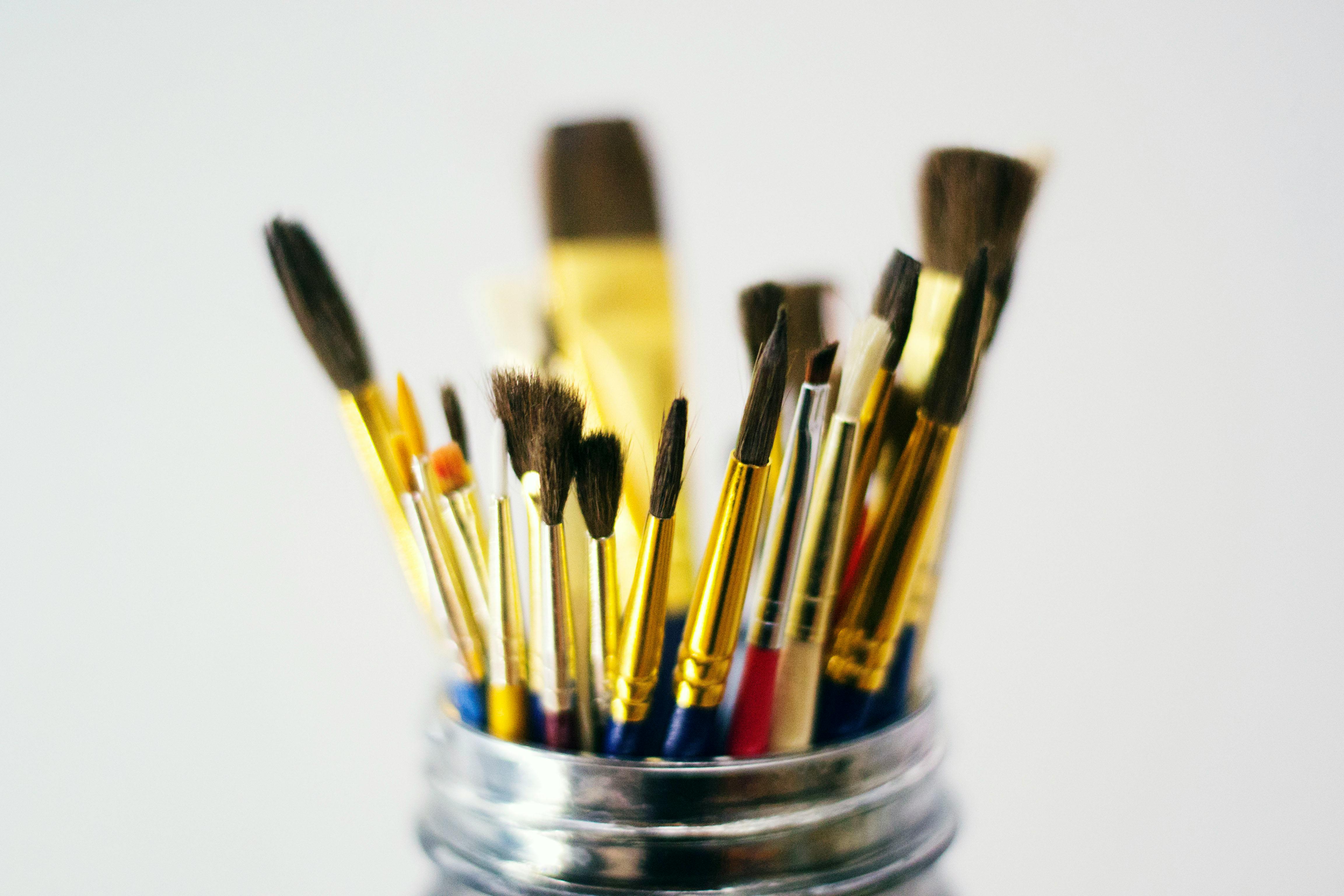 Collection Of Dirty Old Artists Paintbrushes In A Container Stock Photo -  Download Image Now - iStock