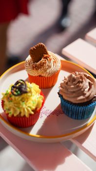 Vibrant cupcakes with decorative icing, perfect for dessert or snack time.