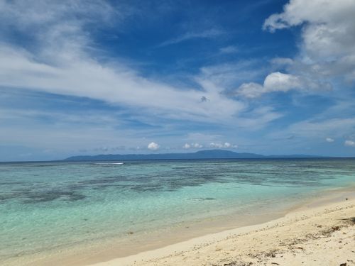 Free Explore the tranquil beach of Gizo, Solomon Islands with clear waters and sandy shores. Stock Photo