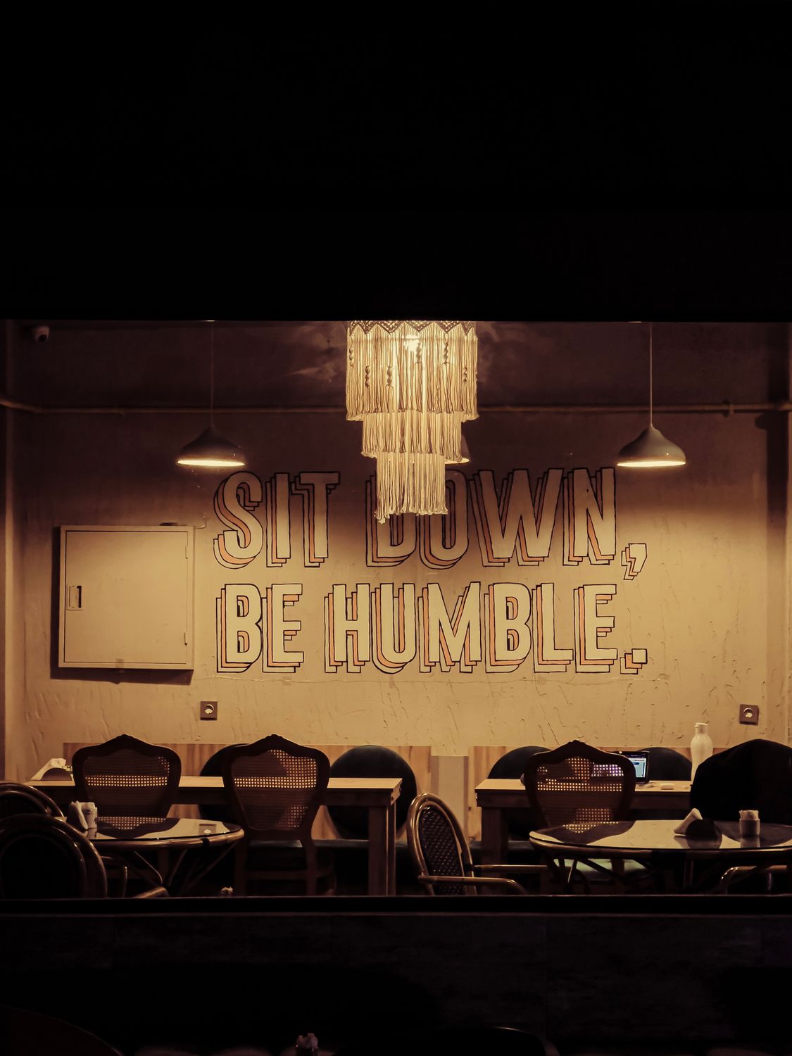 Cozy Restaurant Interior with Motivational Quote Wall Art · Free Stock ...