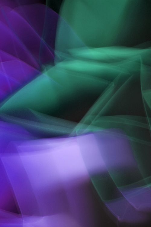 Free Abstract light painting with green and purple hues creating a dynamic and artistic effect. Stock Photo