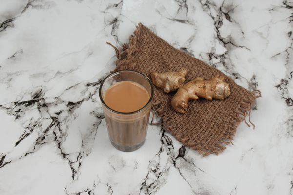 Traditional Indian masala chai on marble