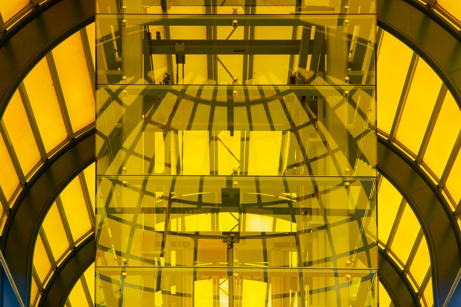 A stunning abstract shot of yellow-tinted geometric architecture in Zoetermeer, Netherlands.