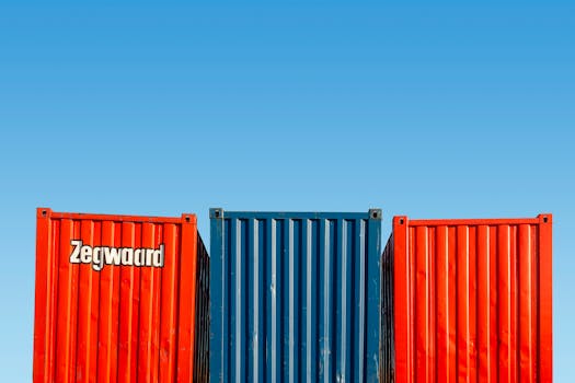 Colorful shipping containers under clear skies, perfect for logistic themes.