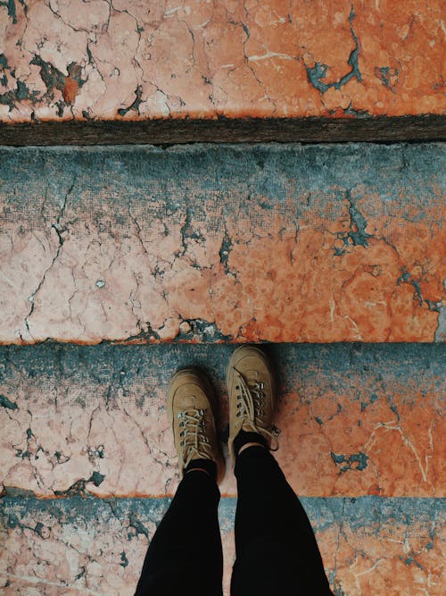 Free Person Standing on Steps Stock Photo