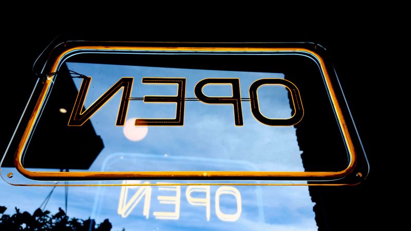 Open sign in a storefront door