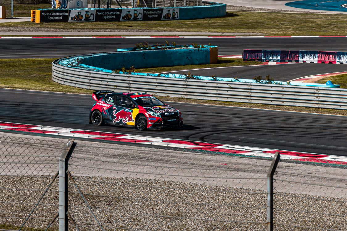 Speed Course Racing High-Speed Racing Car on Track During Competition · Free Stock Photo