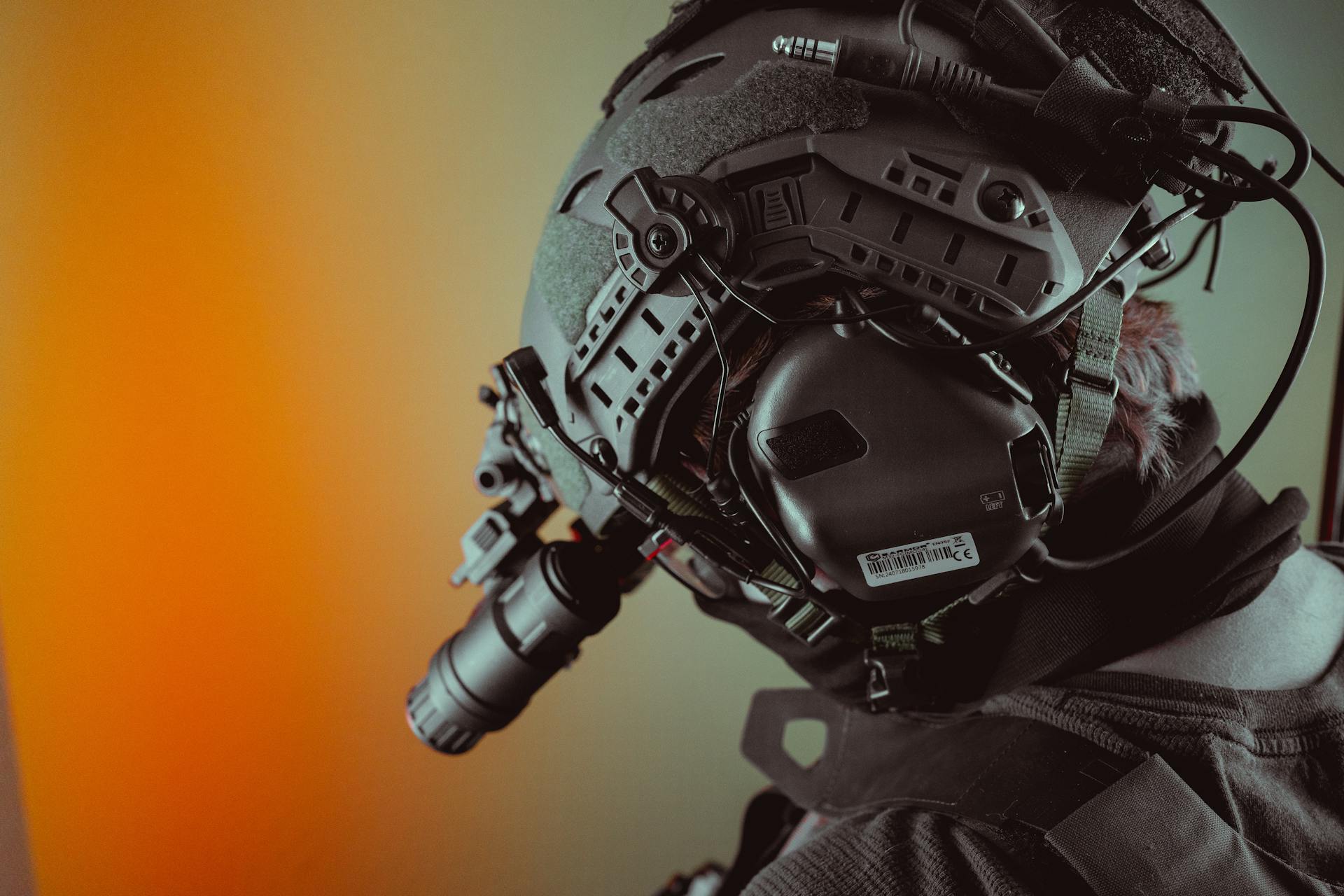 Close-up of a tactical helmet equipped with night vision gear, emphasizing technology.