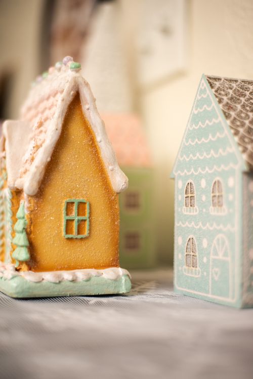 Free Close-up of colorful gingerbread houses captures a festive holiday atmosphere. Stock Photo