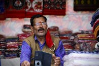 Traditional Market Vendor in Vibrant Setting