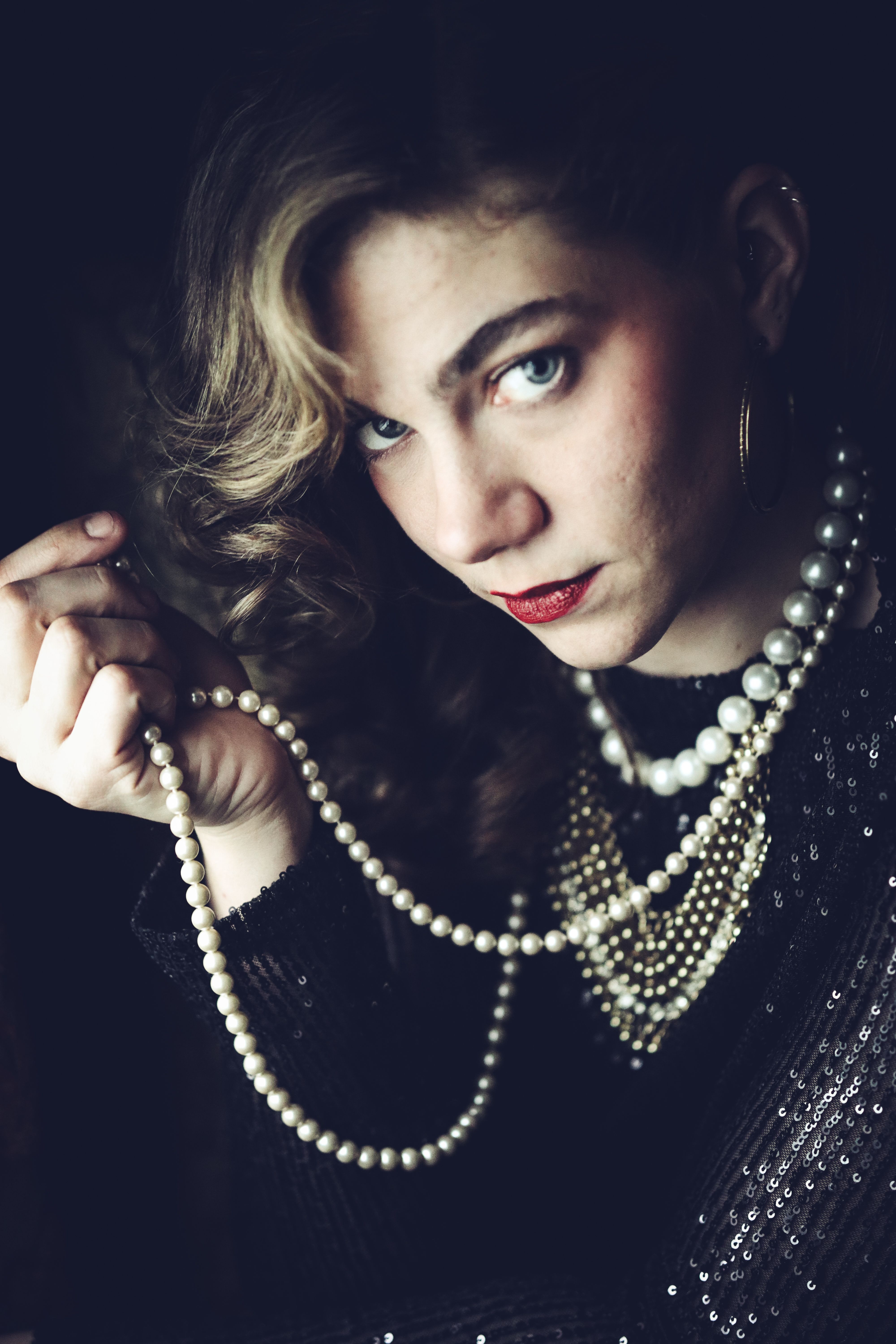 Elegant Portrait with Pearl Necklace in Vintage Style · Free Stock Photo
