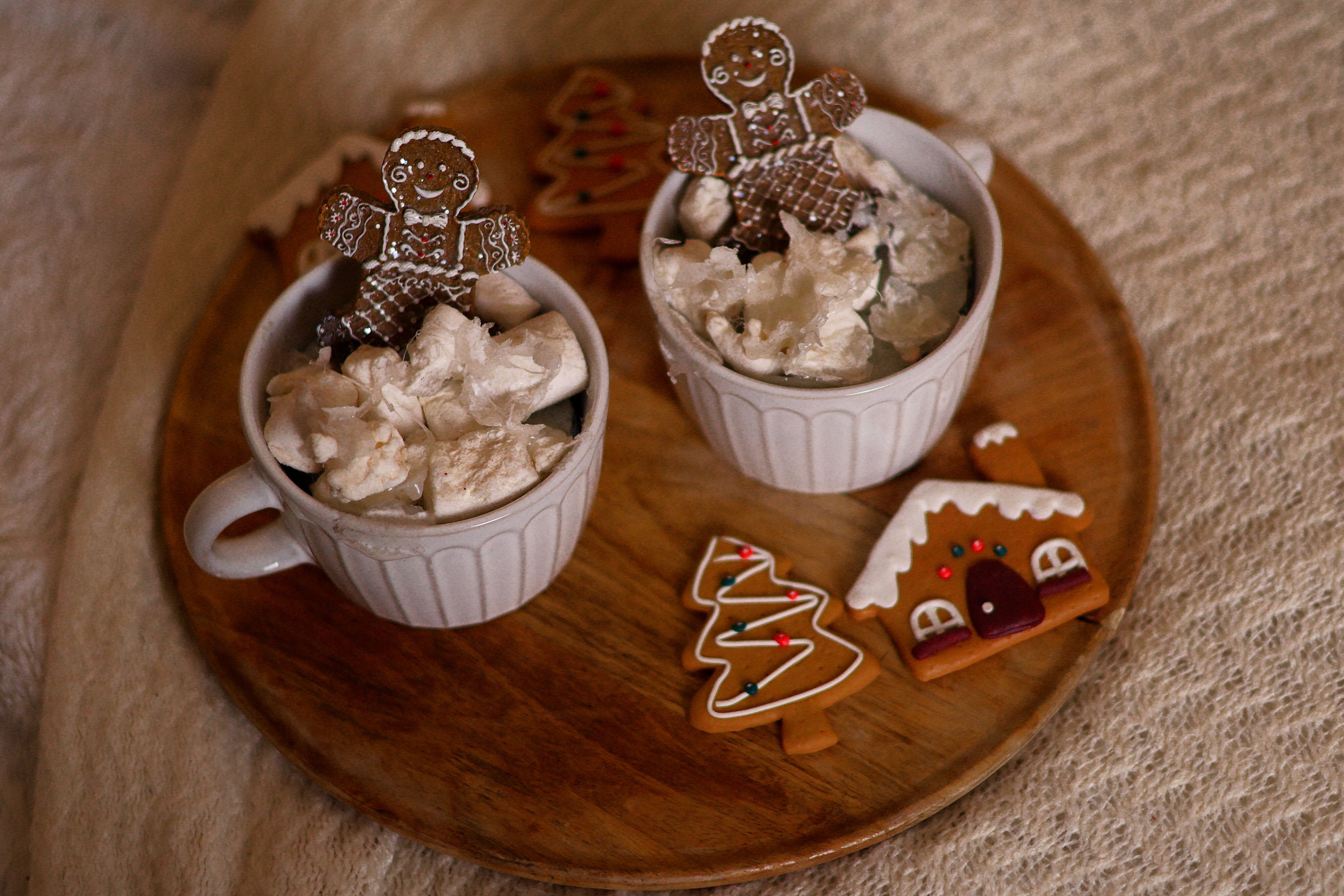 Colorful icing and candy decorations on gingerbread cookies