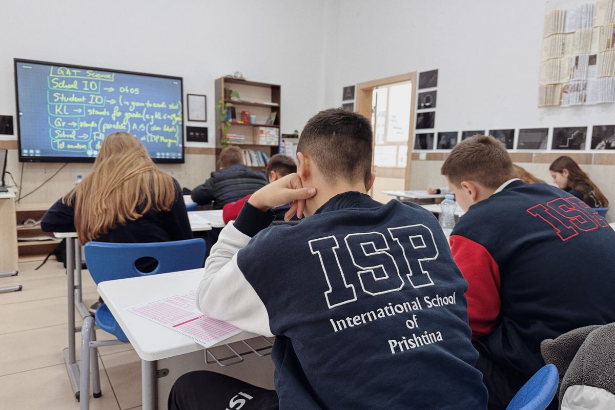 Students and teacher in a modern Pakistani school classroom using the WordbitX education management platform