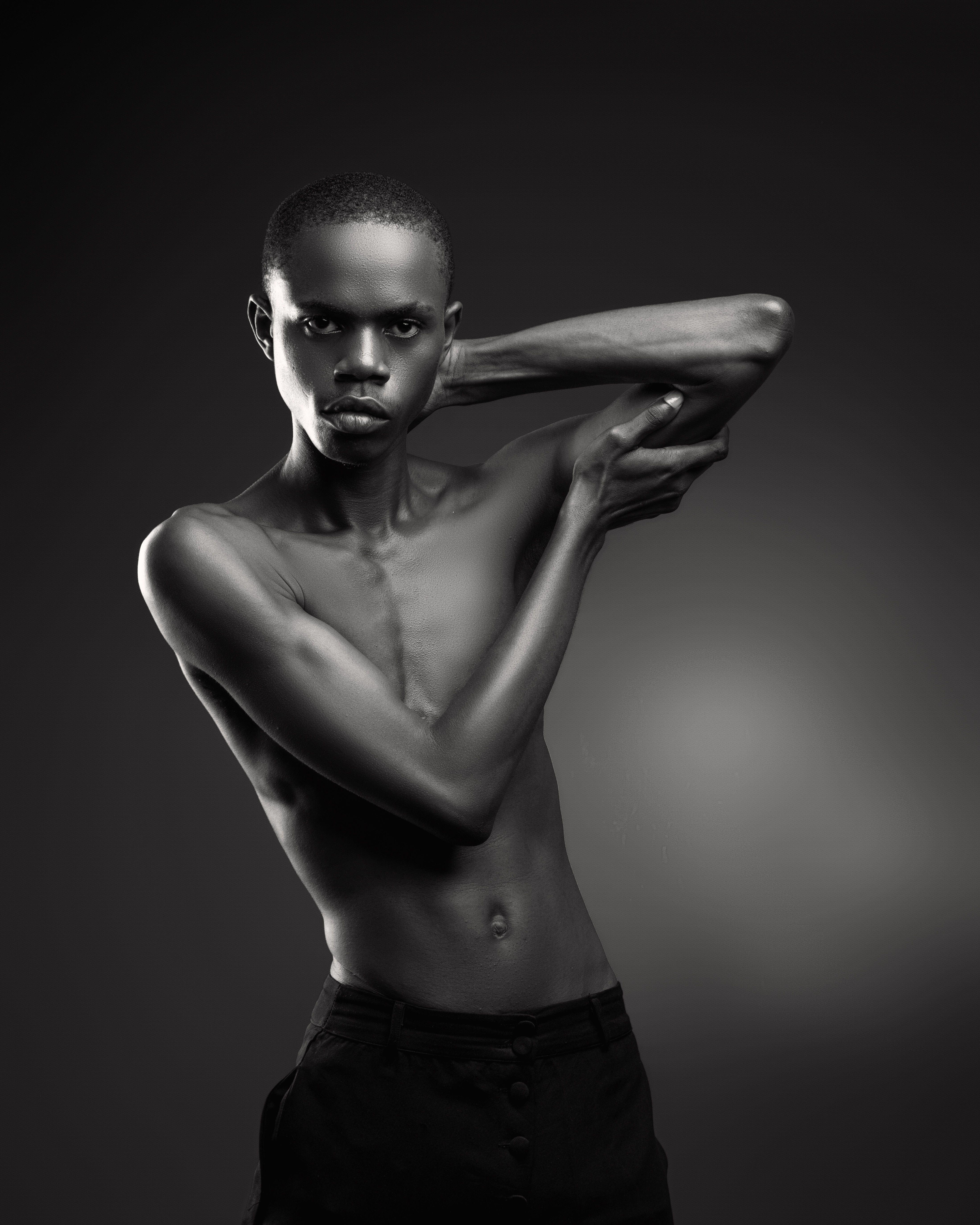 Elegant Black and White Artistic Portrait of a Young Man · Free Stock Photo