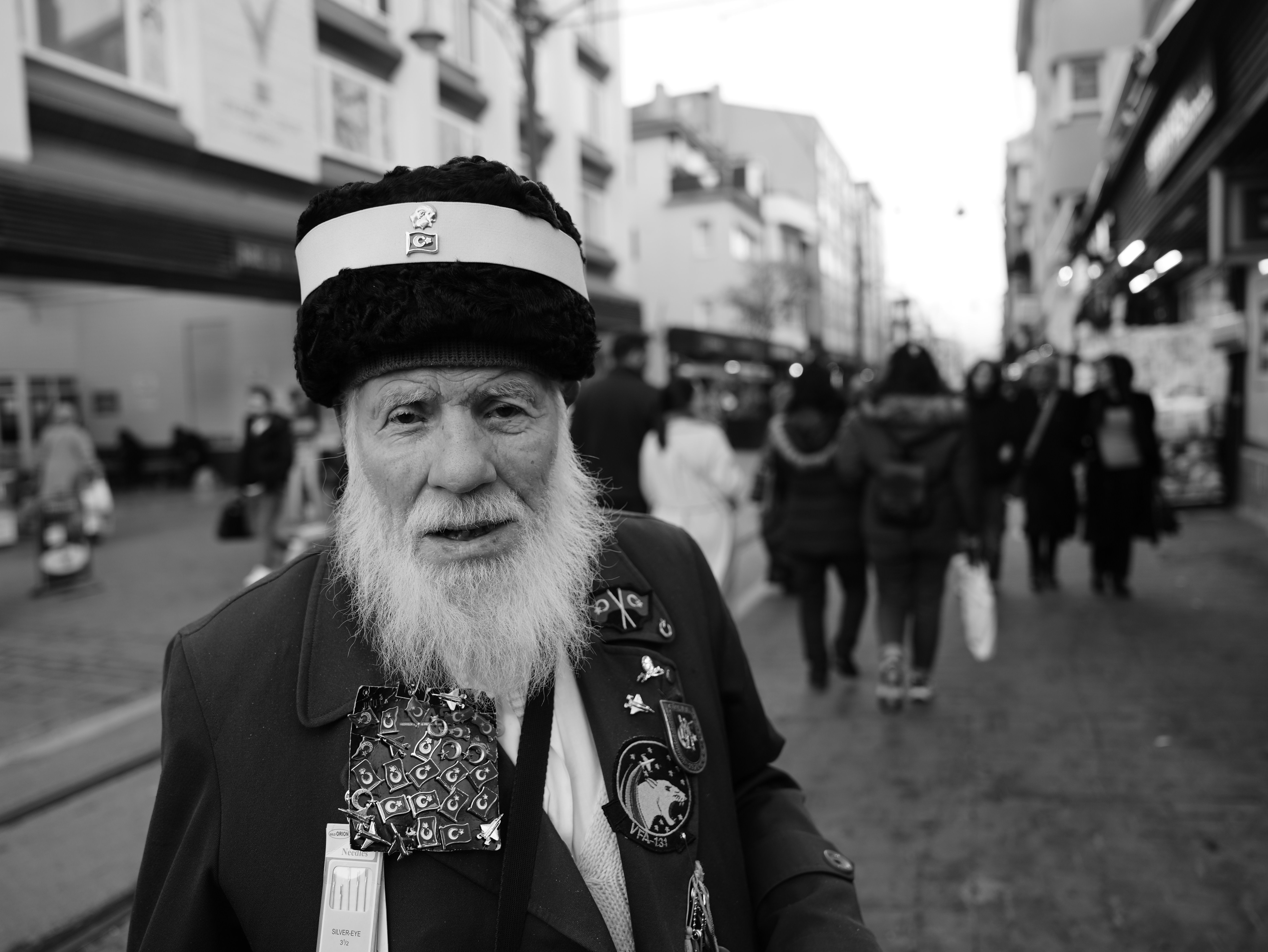 Elderly Man in Traditional Attire on Bursa Street · Free Stock Photo