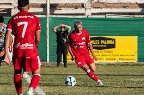 Free A dynamic scene of an amateur soccer match featuring players in action on the field. Stock Photo