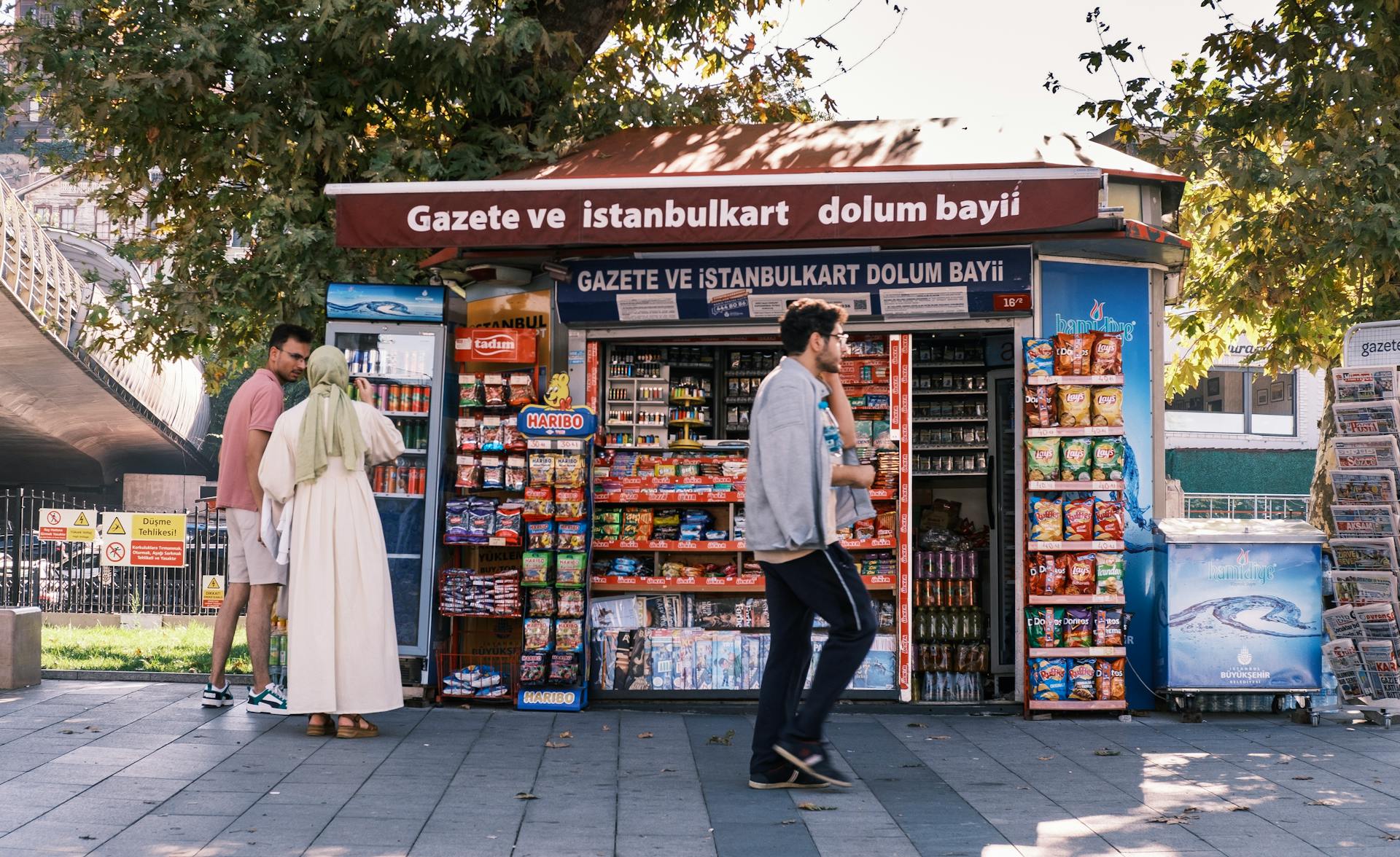 Vibrant Istanbul street kiosk displaying snacks and beverages.