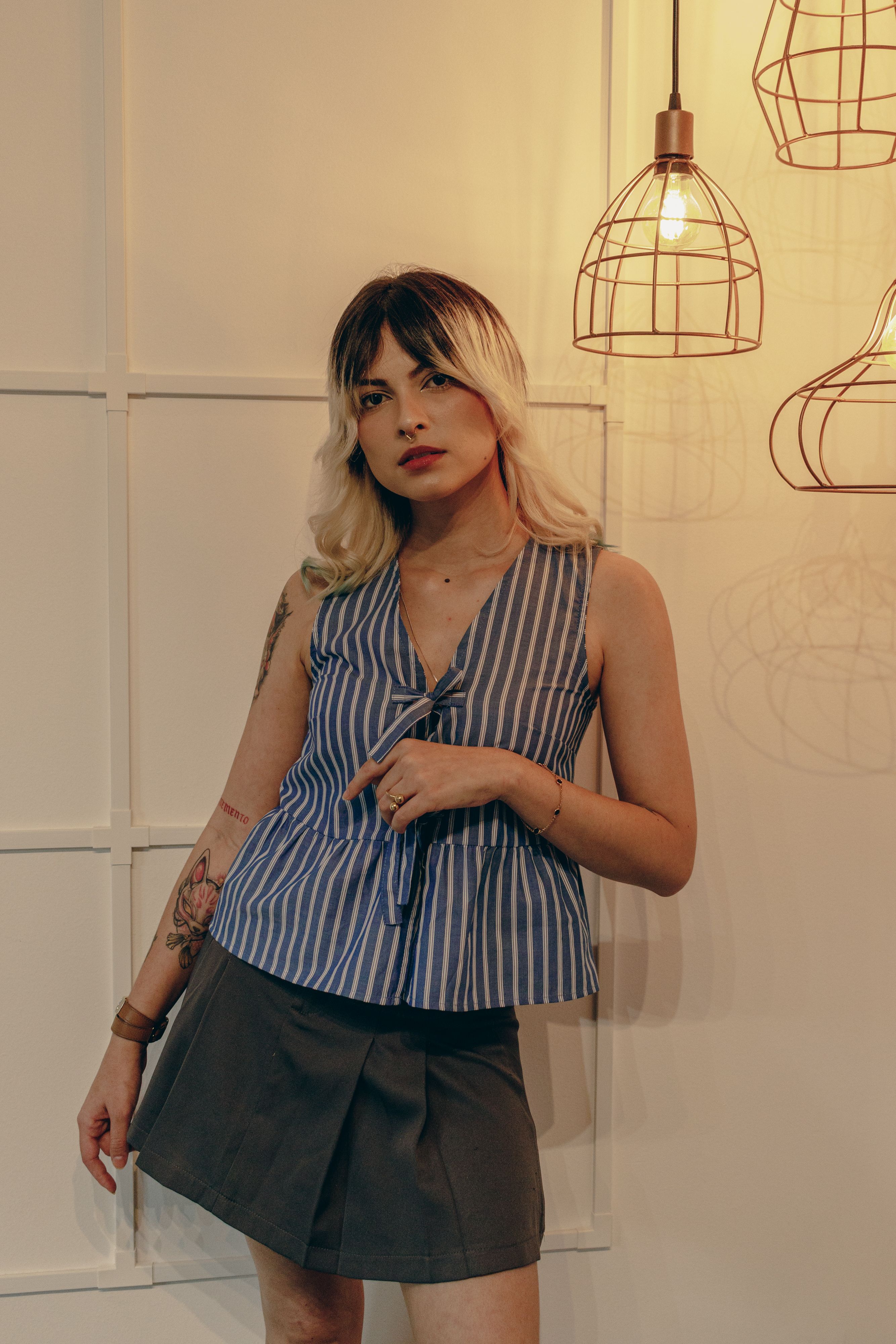 Fashionable Woman in Stylish Indoor Setting · Free Stock Photo