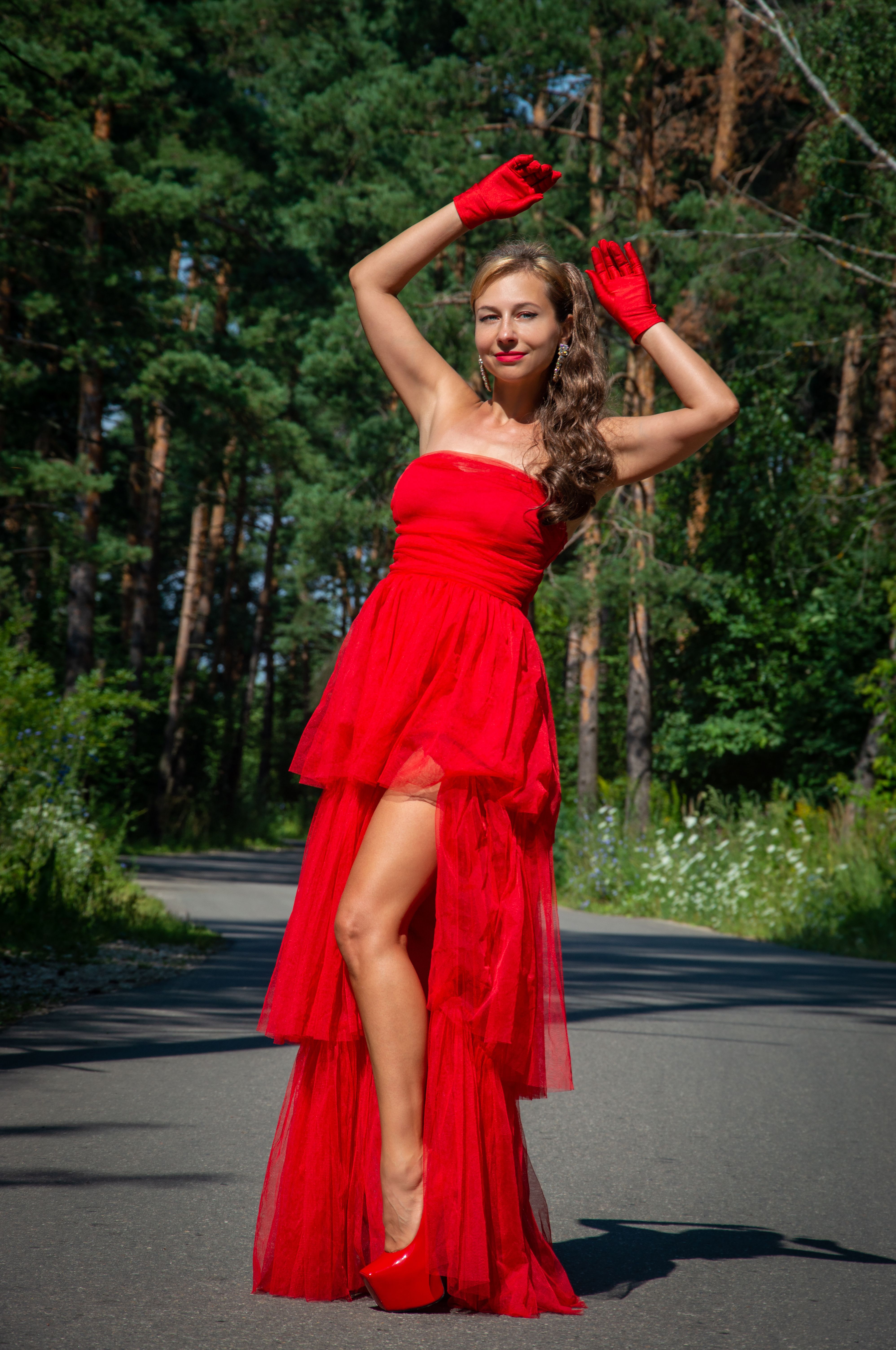 Elegant Woman in Red Dress Outdoors · Free Stock Photo