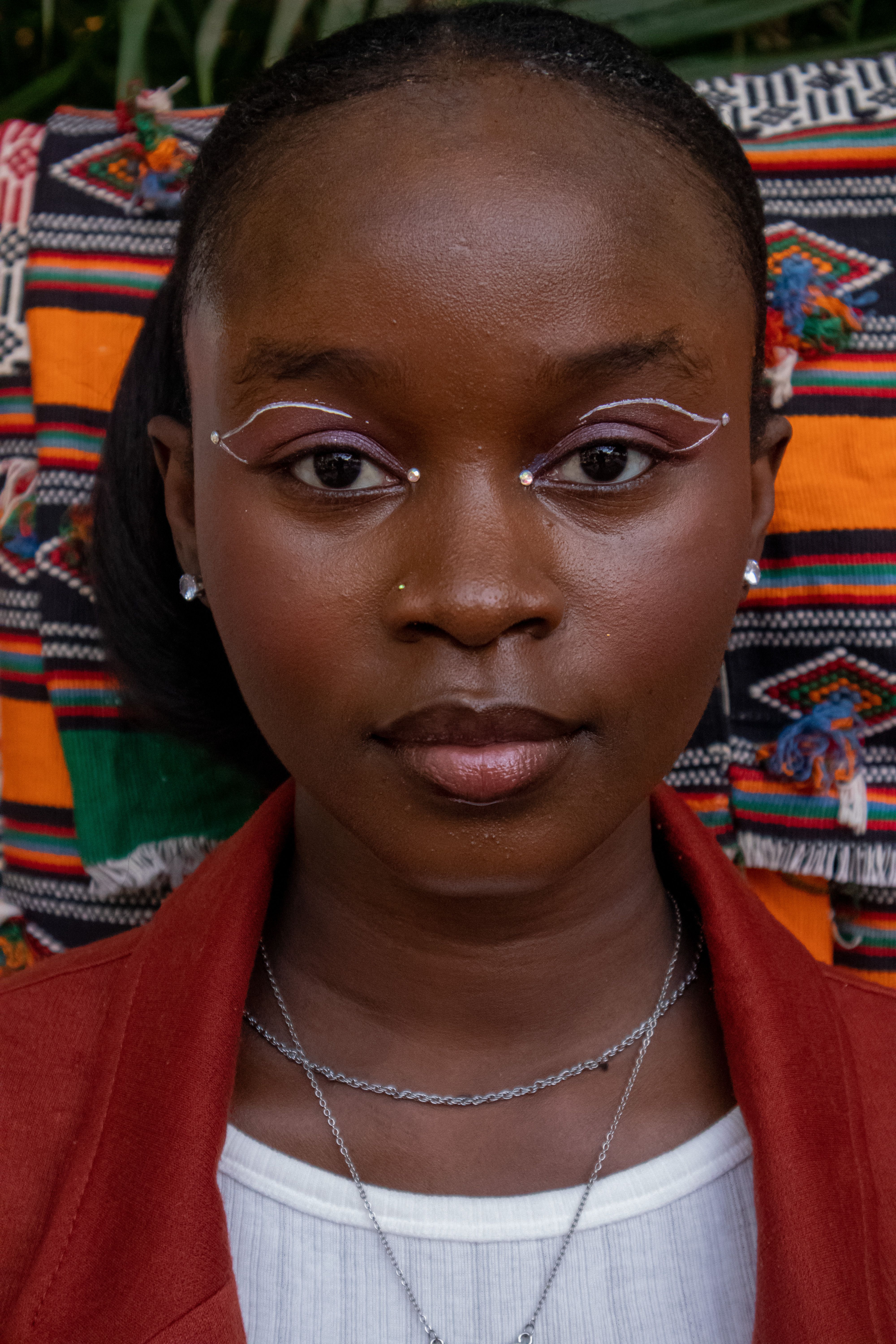 Vibrant Portrait with Traditional African Textile · Free Stock Photo
