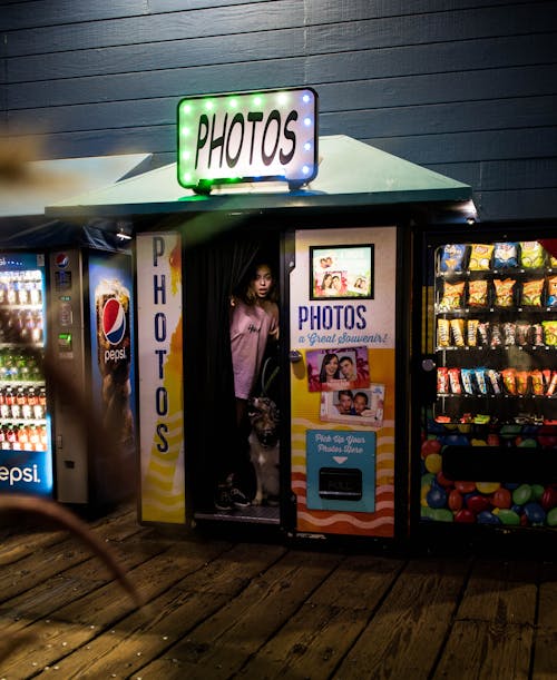 Free Photo Of Woman Standing Inside Photo Booth Stock Photo