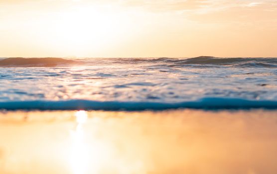 Serene sunset over the ocean waves in Los Angeles, California. Perfect for relaxation themes.