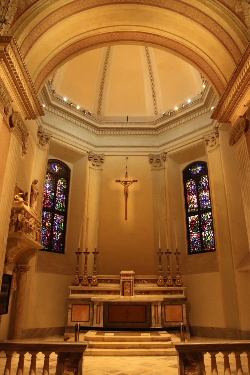 Free Interior of a Milano cathedral showcasing intricate architecture and colorful stained glass windows. Stock Photo