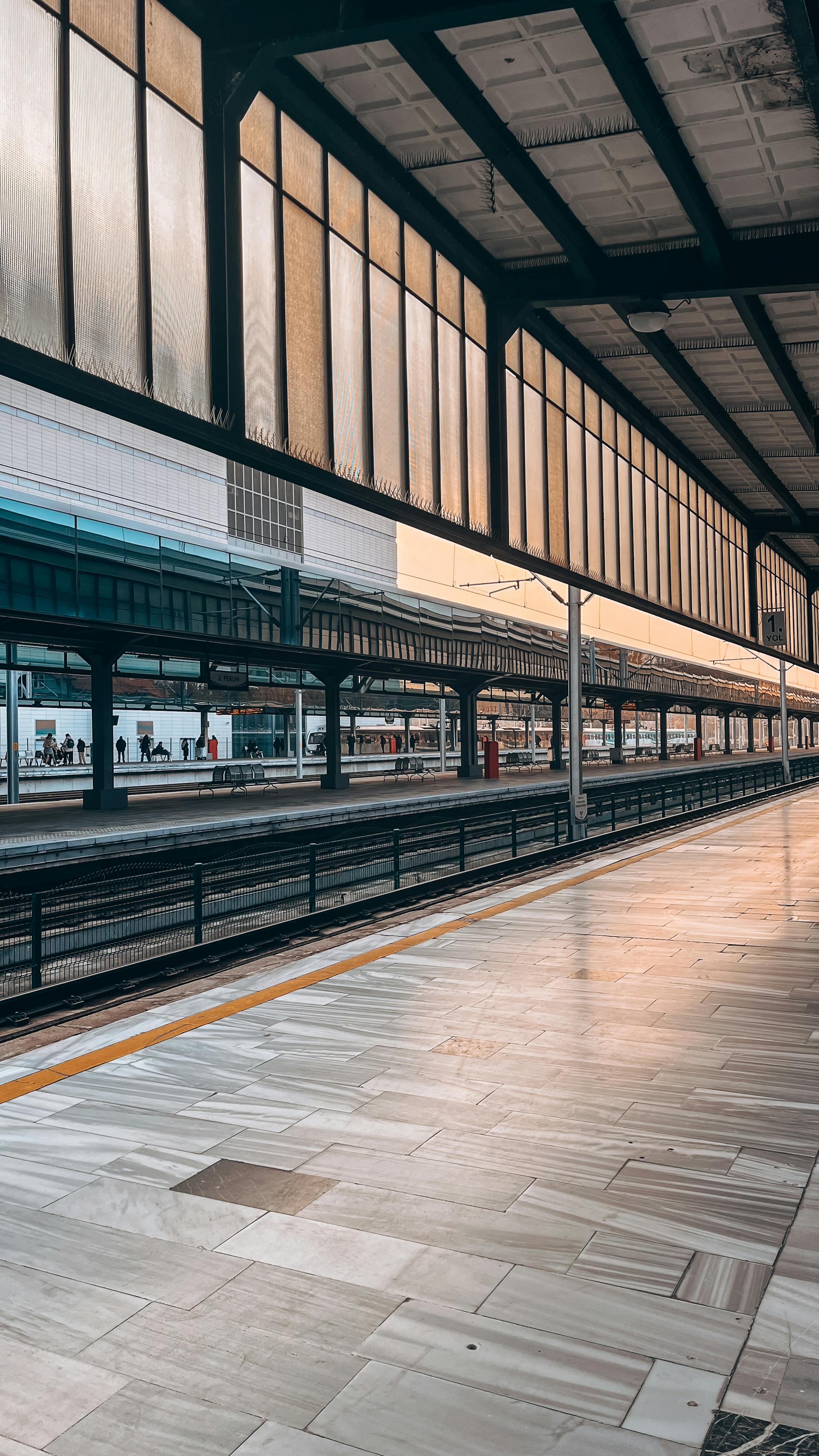 modern train station platform at sunset