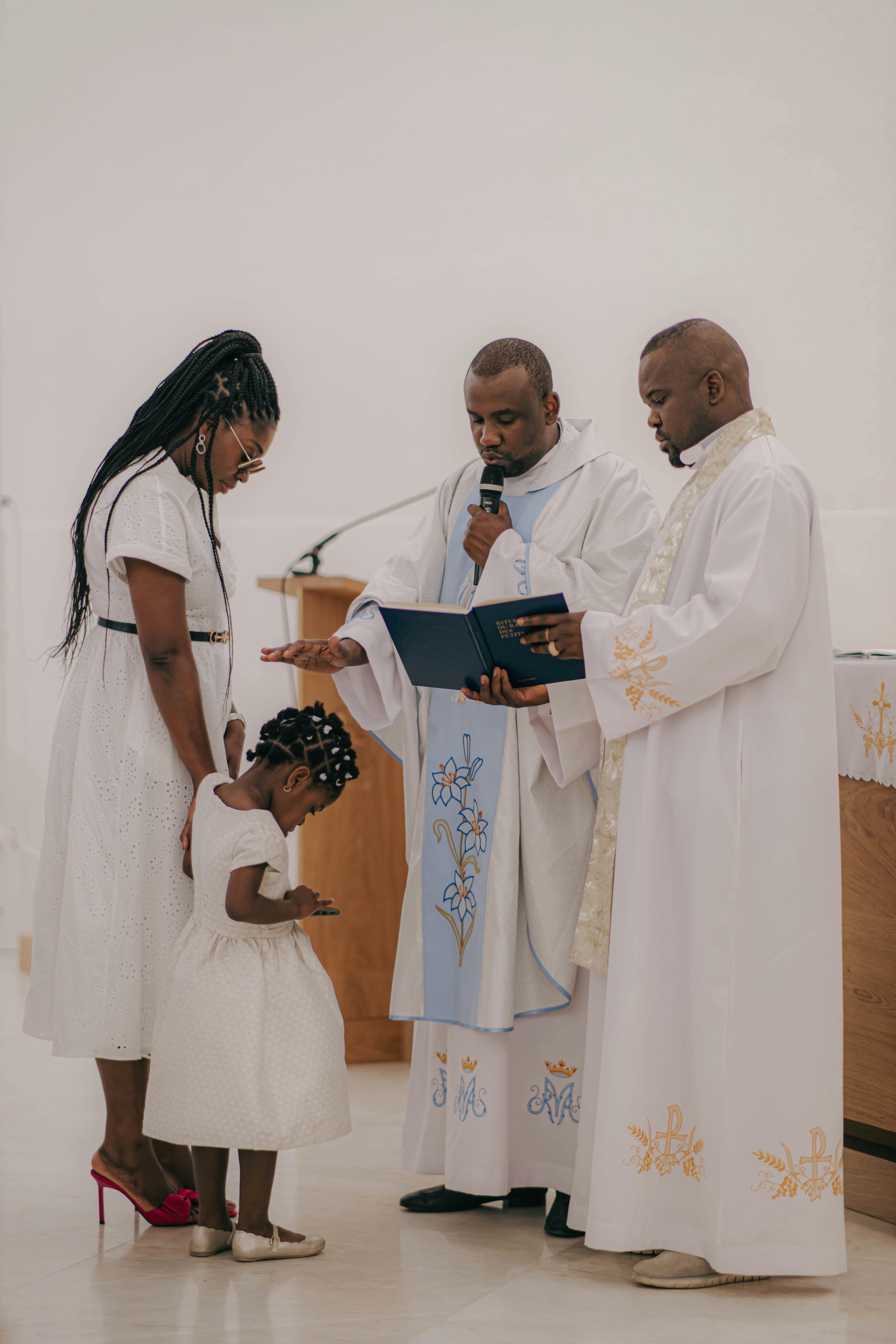 baptism ceremony in church with family attending