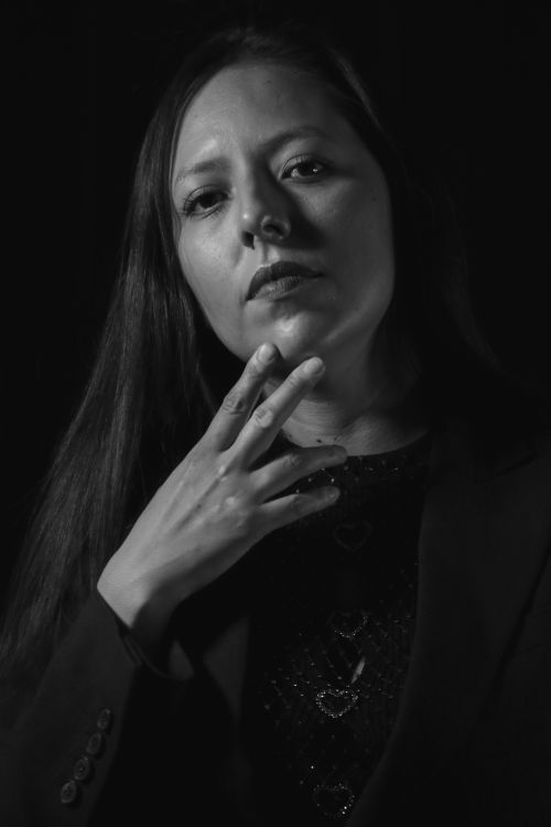 Free Intense black and white portrait showing a woman in deep thought. Stock Photo