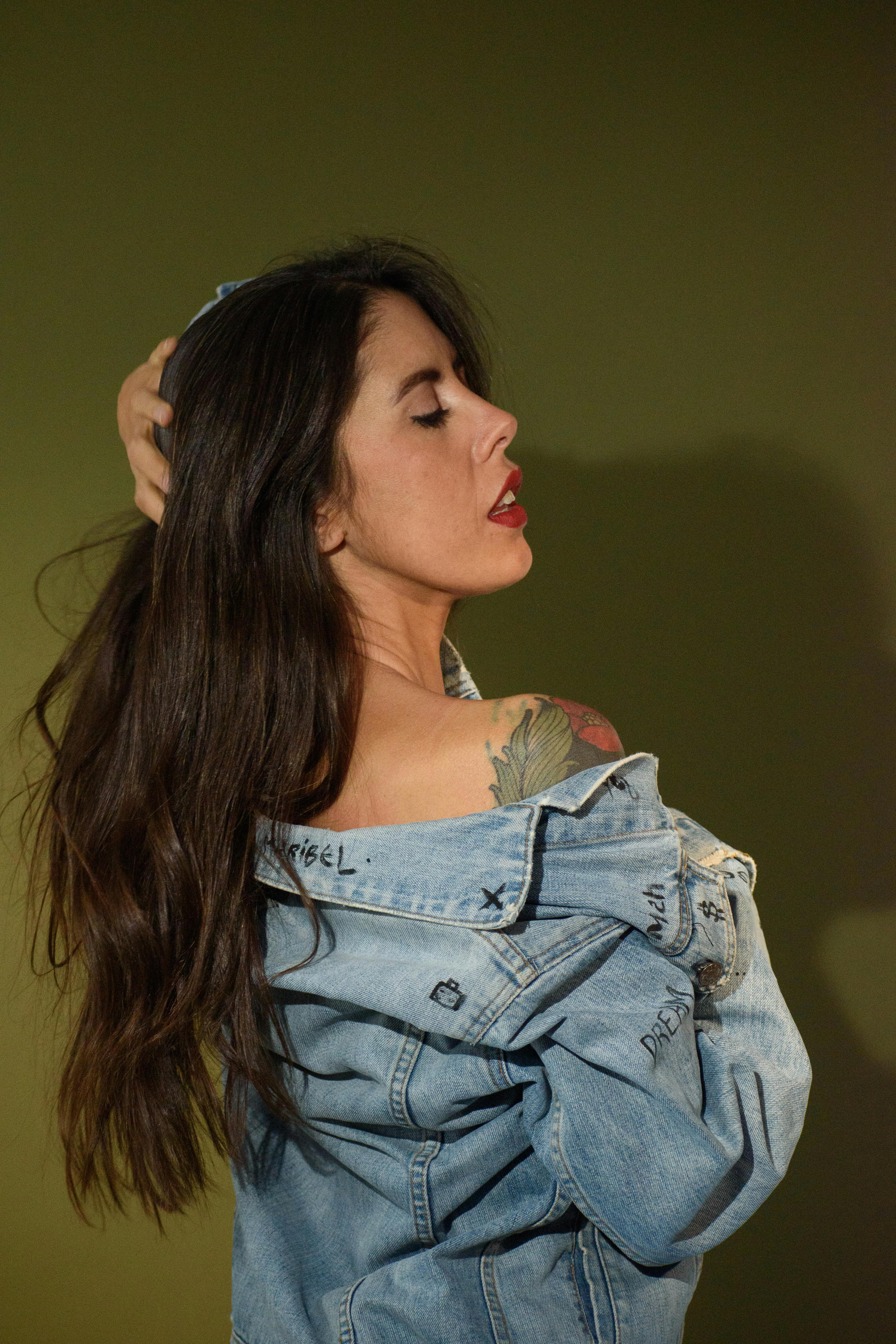 elegant portrait of woman in denim jacket