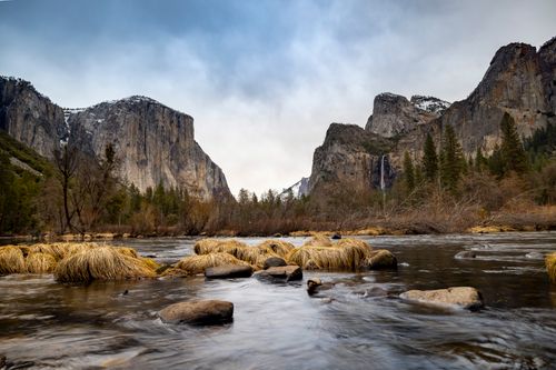 Free Stunning landscape of Yosemite's lush valley with a flowing river in winter. Stock Photo