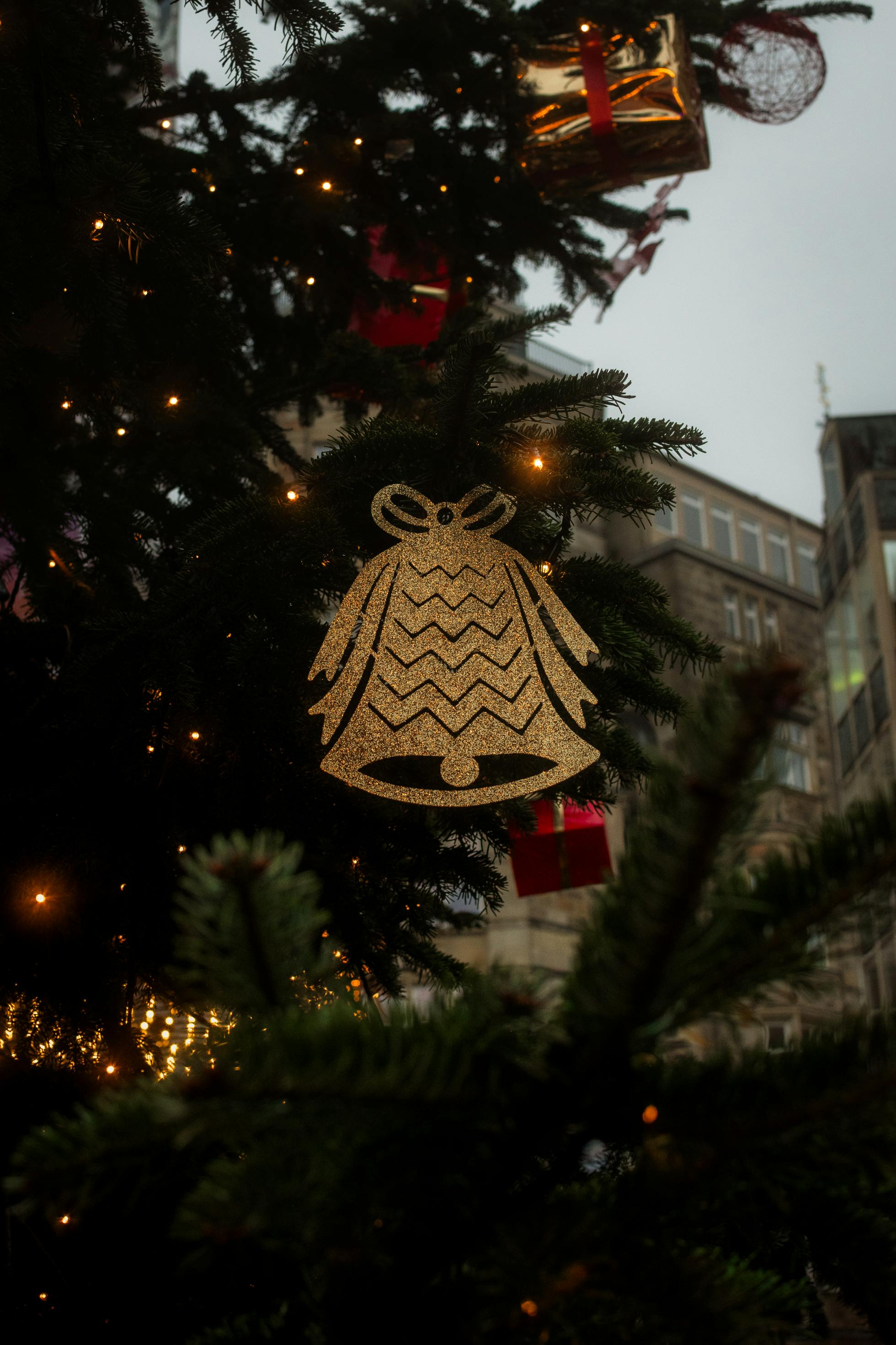 festive christmas tree with bell ornament decoration