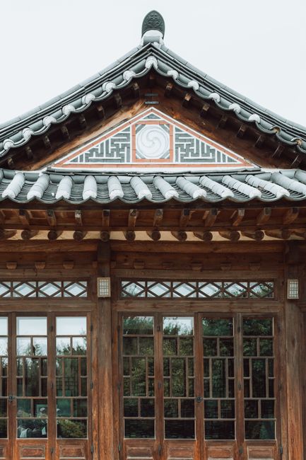 Ornate traditional Korean roofline and wooden facade typical of a Confucian academy