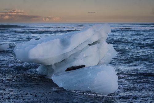 Free Breathtaking scene of icebergs at Jökulsárlón in Iceland during sunrise. Stock Photo