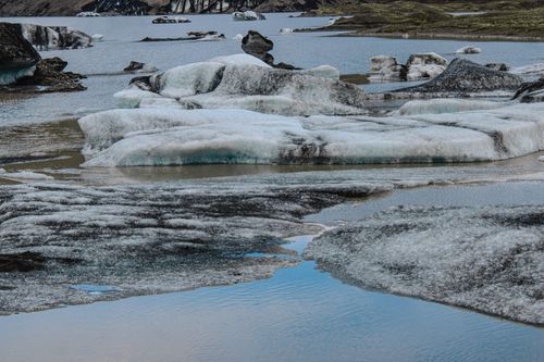 Free Explore the serene beauty of Jökulsárlón glacial lagoon in Iceland's summer. Stock Photo