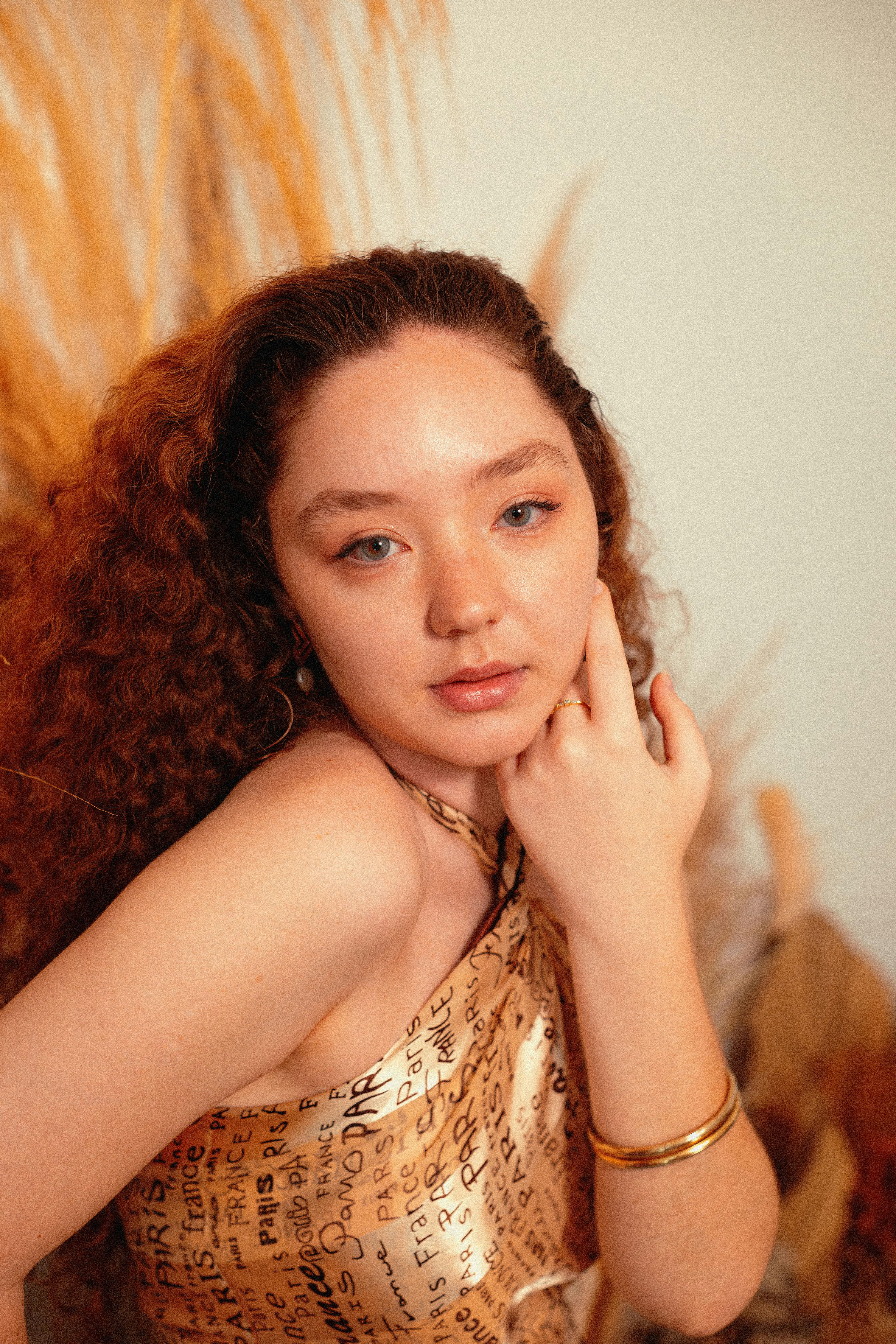 portrait of a woman with curly hair in sao paulo